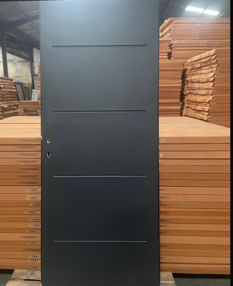 Modern Design Steel Security Door with a black frame and decorative copper or bronze-toned woven pattern