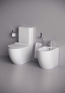 wall-mounted, foldable pot filler faucet in a brushed gold finish