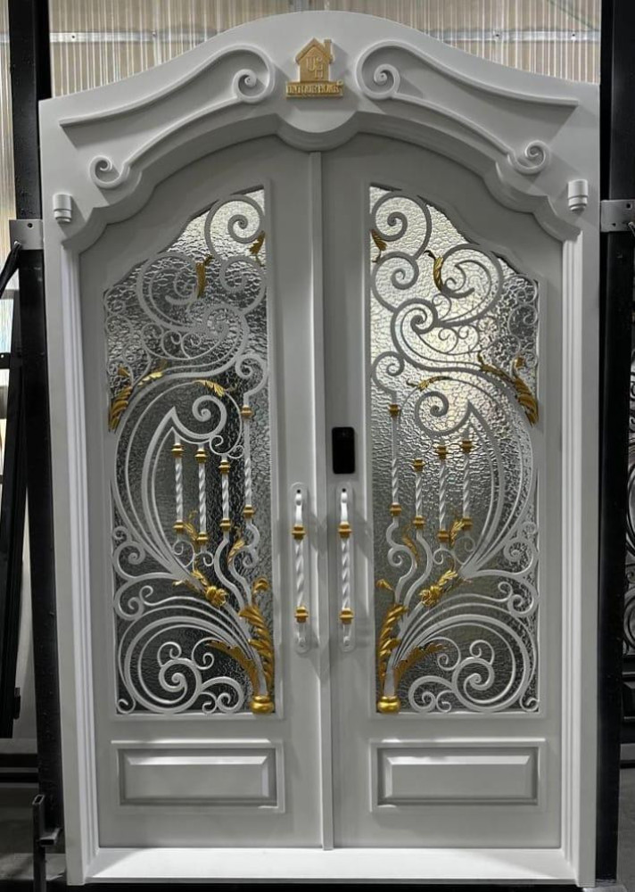 White Wrought Iron Door with decorative gold accents