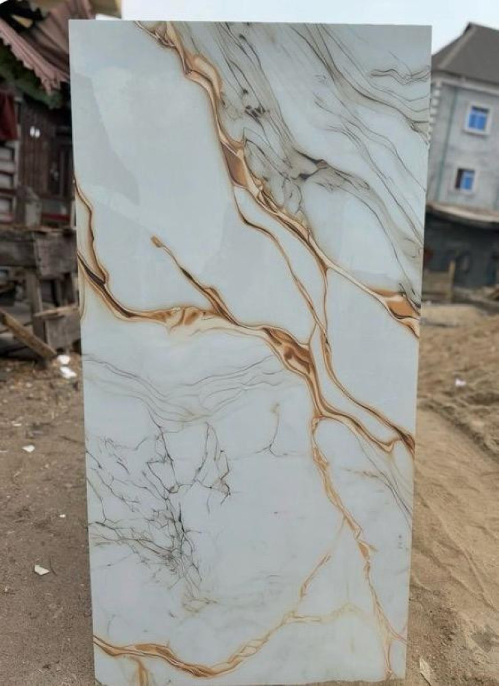 White marble-patterned vinyl peel-and -stick wallpaper 