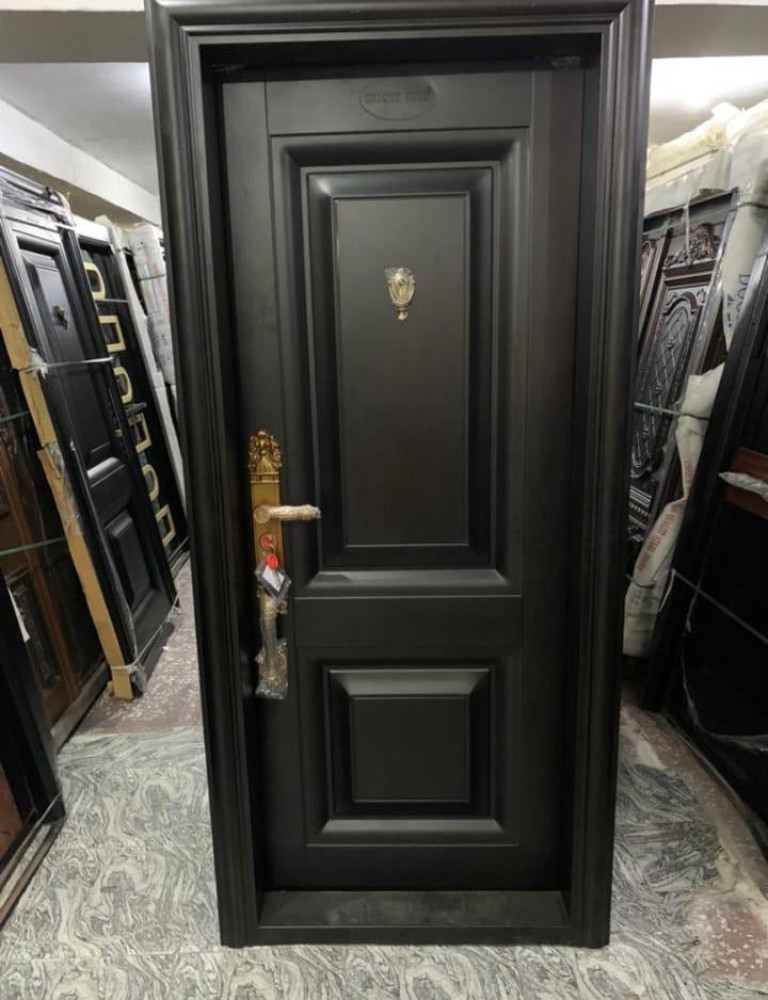 Black Security Door likely a Watson Chinese Security Door or Similar Steel Door