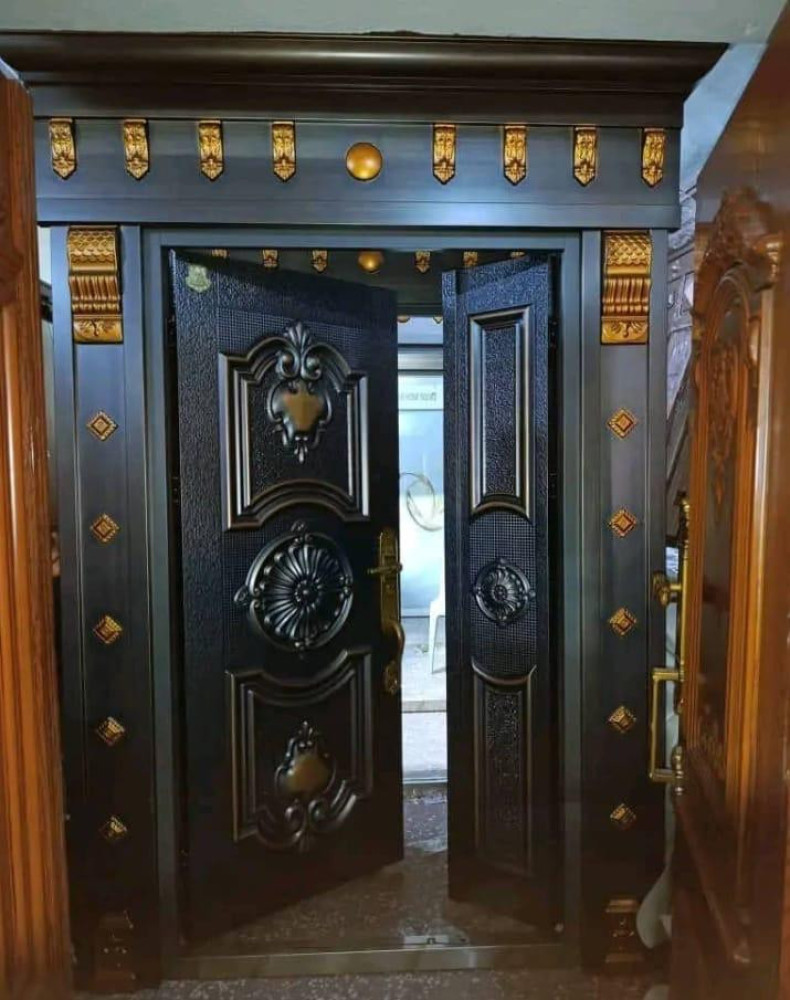 Black and Gold Security Door likely Steel or reinforced metal model