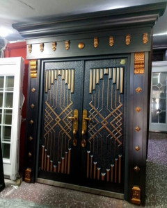 Double-leaf Steel Security Door with a black finish and gold-coloured decorative accents