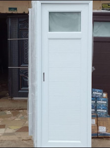 Modern White Aluminum Front Door with Horizontal panels and a top glass window