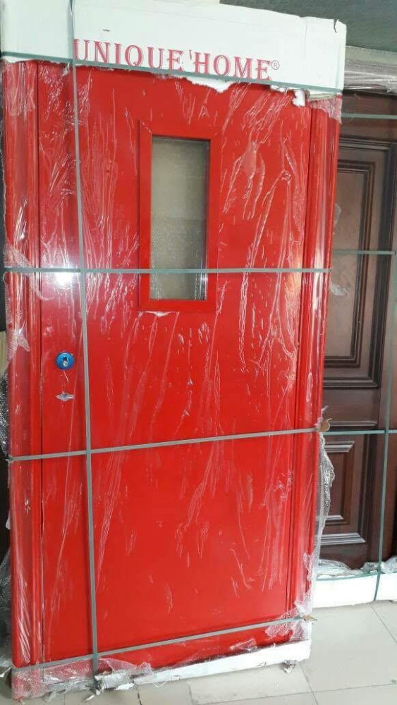 Red fire-rated steel Door with a glass lite