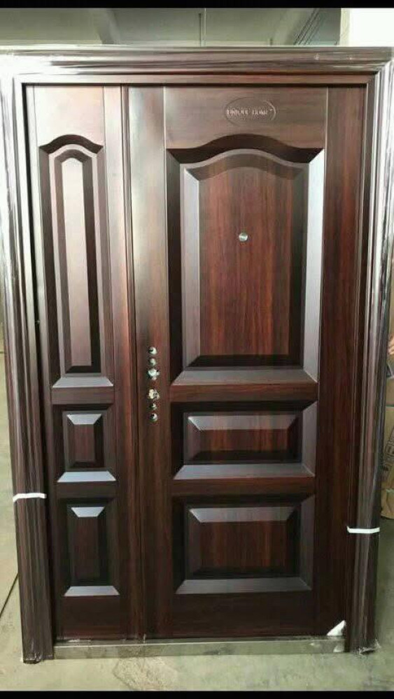 Double-leaf Security Door likely made of steel with a wood-grain