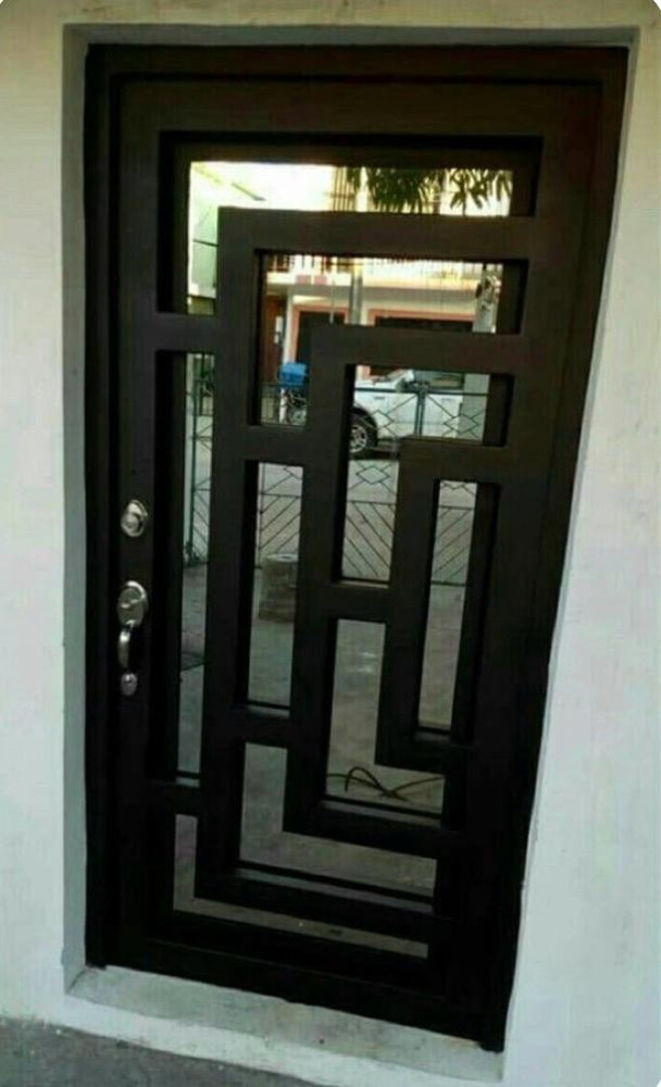 Modern Metal and Glass entry door with an abstract geomtric design