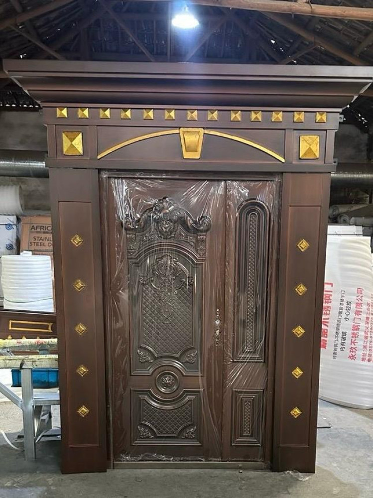 Copper Cst Ark and Pillar Doors