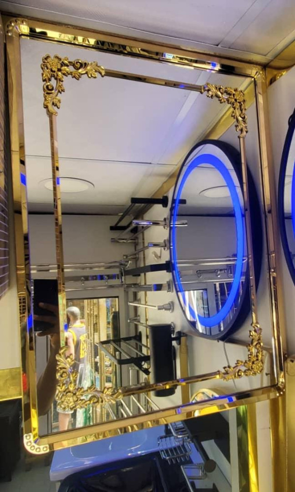Mirror with an Ornate Gold-cloured frame
