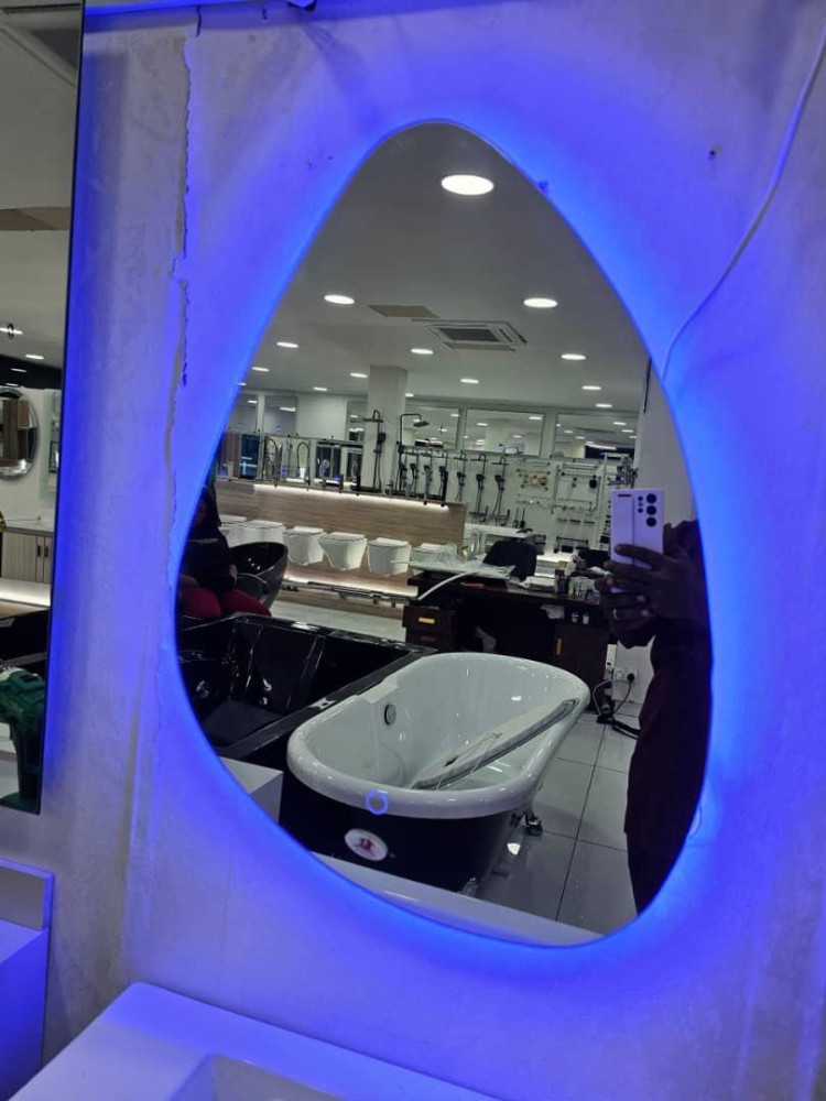 Mirror with a blue LED light frame