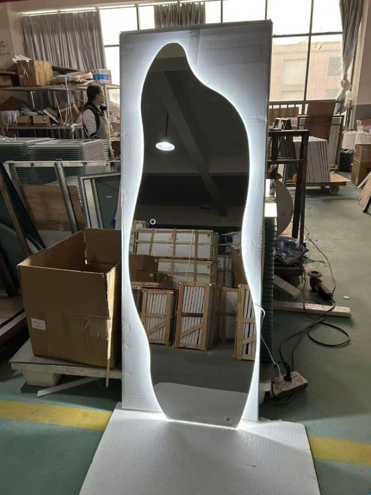 Full-length Backlit Led mirror with an irregular wavy shape
