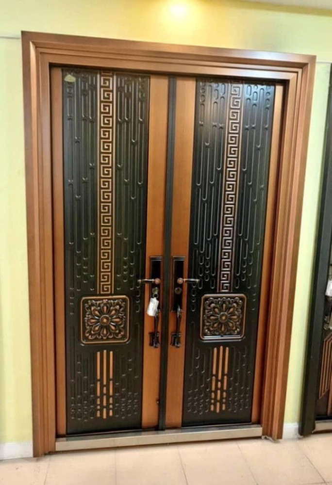 Double-panel Turkish Steel Security Door with a brown frame and black panels 