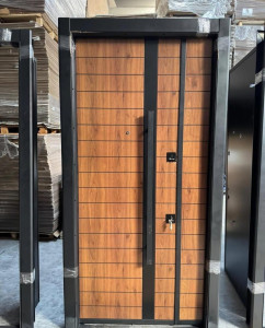 Modern Exterior Security Door with a wood grain finish and prominent black metal