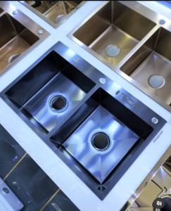 Double-bowl kitchen sink likely made of stainless steel