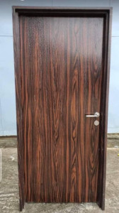 High-quality Israeli-style interior or security door with a dark wood-grain finish