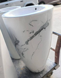 Freestanding Cermaic Wash Basin with a marble effect design