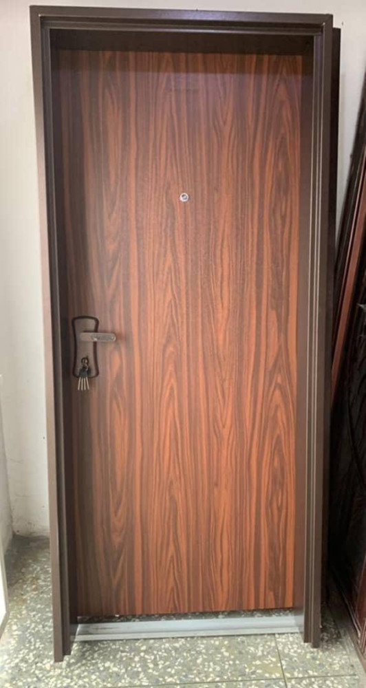 Israeli Security door with a wood-grain vinyl finish