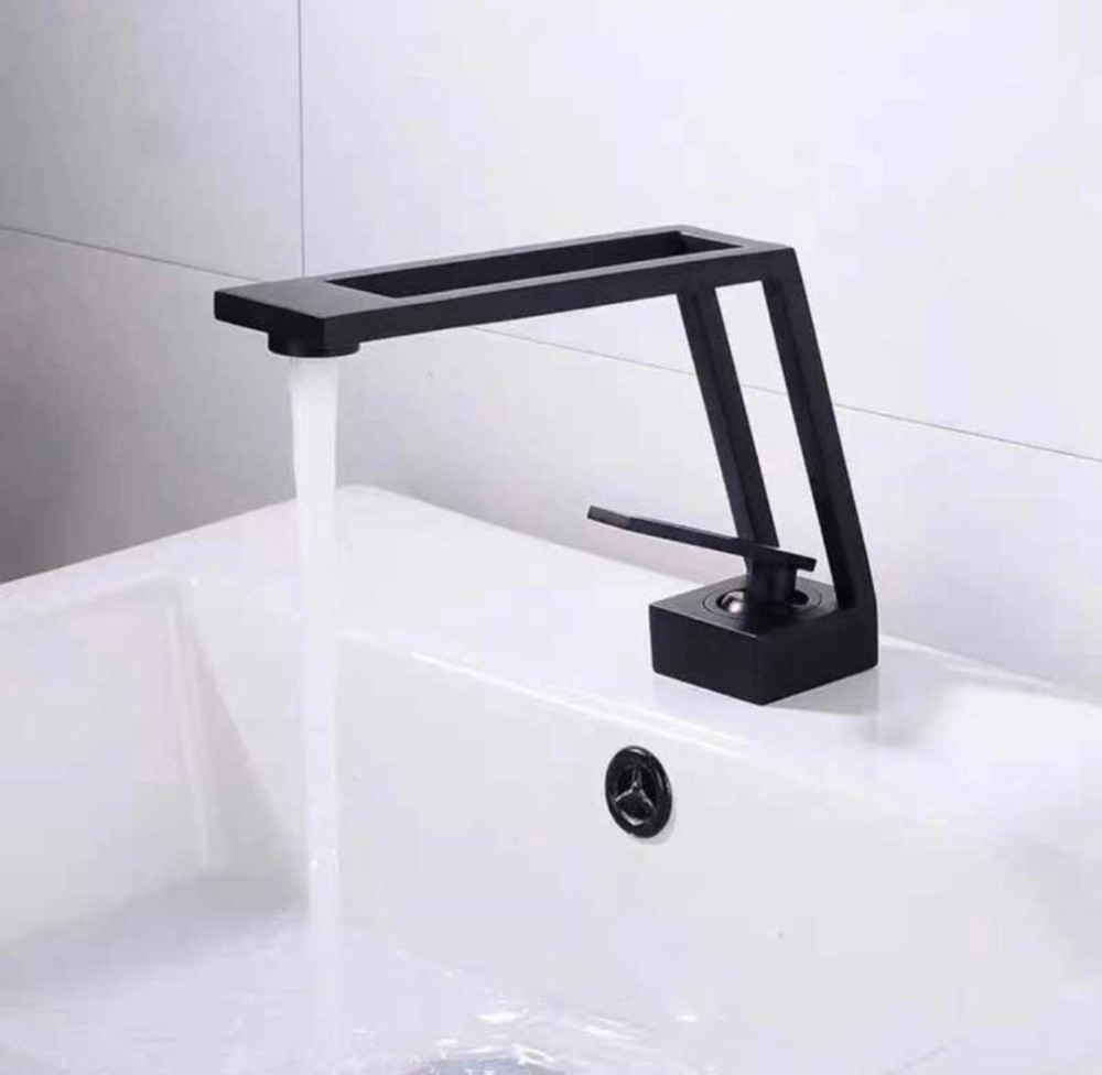 Modern matte blacl single-handle bathroom sink faucet with a creative, geometric design