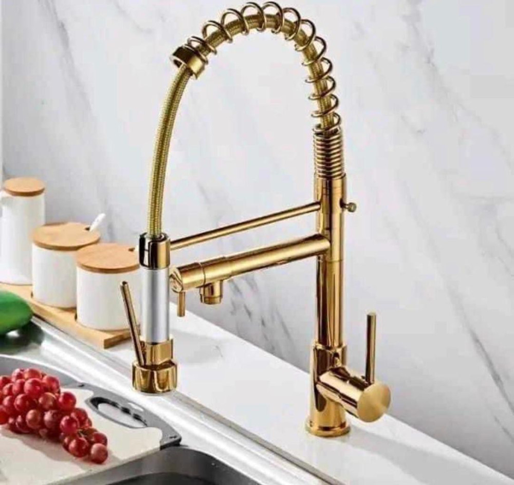 Golden Kitchen faucet with a pull-out sprayer