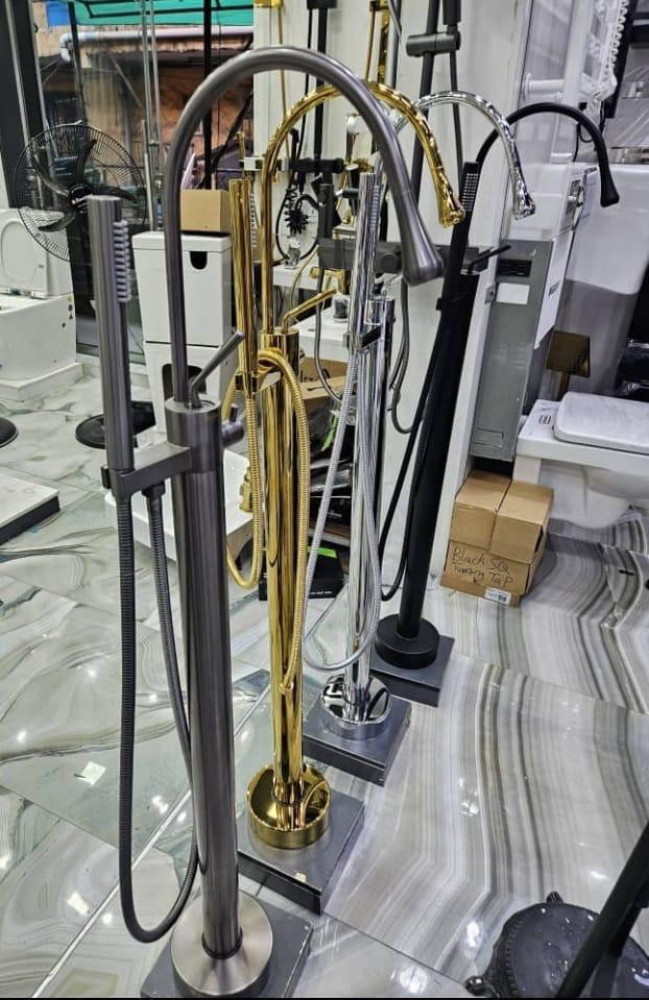 Several freestanding bathtub faucets in different finish