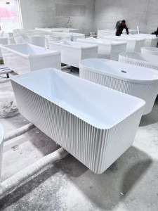 Freestanding bathtub with a fluted design