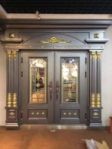 Cast Aluminum or Steel Security Double Door with a gray finish and gold decorative elements