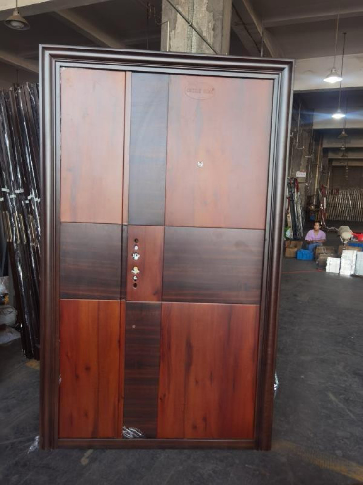 Turkey Steel Security Door with a wood finish and a multi-point locking system