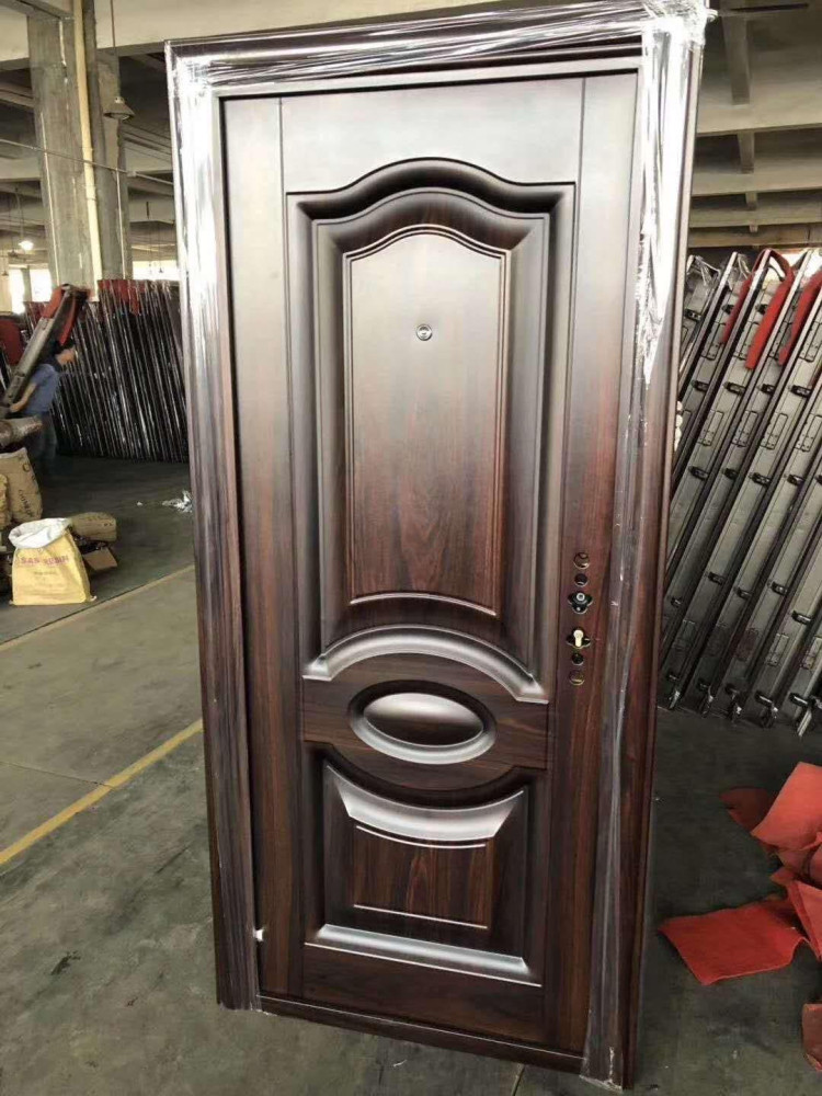 German-style steel Security Door with a brown wood-grain finish