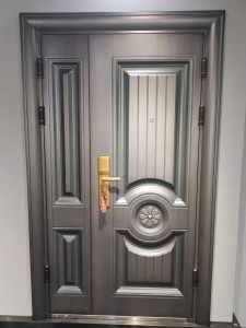 Steel Security Door a robust multi-panel design with a metalic grey finish