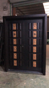 Modern Double steel Security Door with a dark frame and decorative wood-look panels