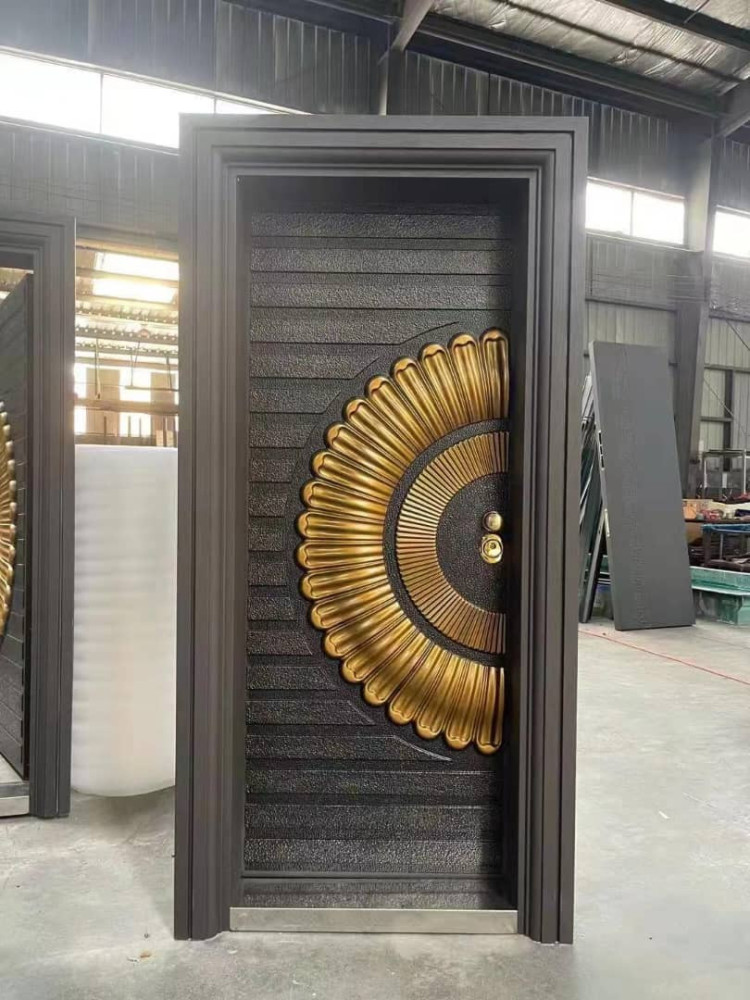 Modern Security Steel Door with a distinctive gold-coloured sunburst-pattern relief design