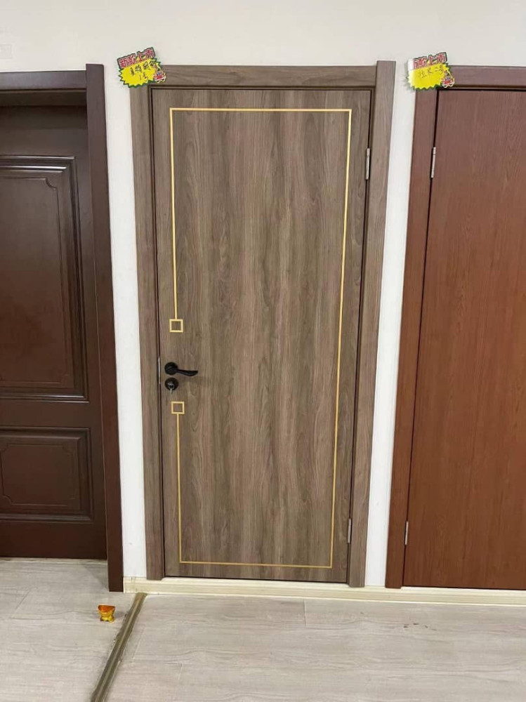 Modern Interior Door with a wood-grain melamine or PVC finish and gold trim
