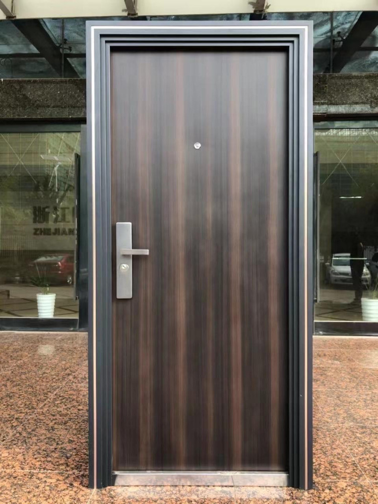 Steel Security Door with a dar wood-grain finish and a lever handle