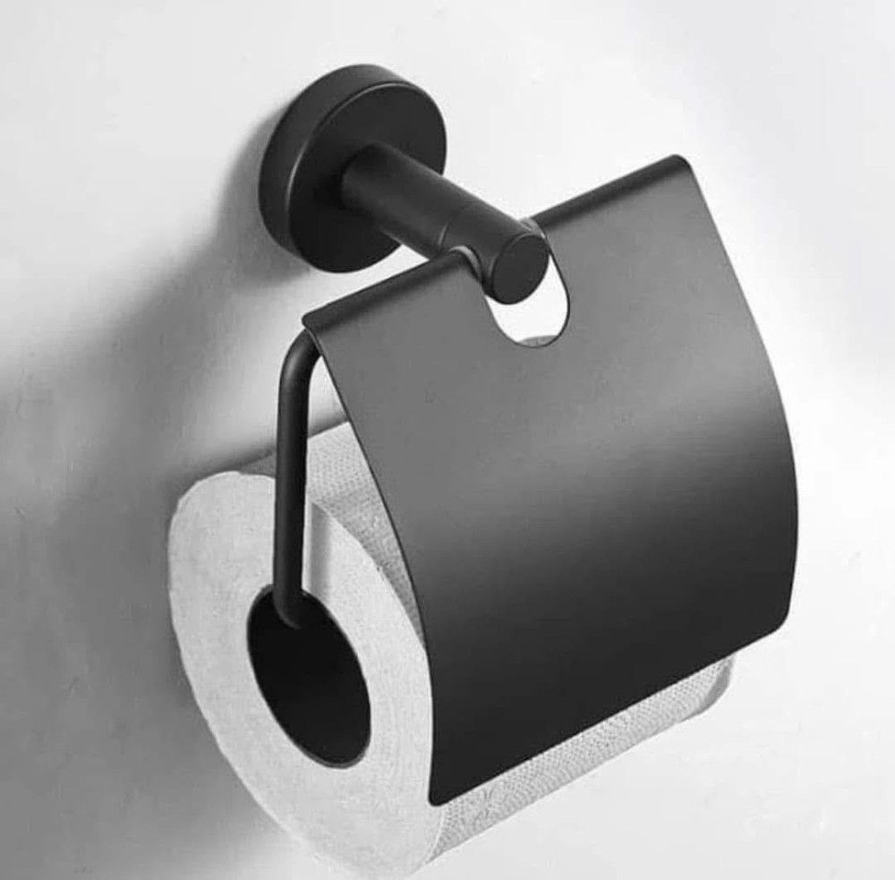 Wall-mounted toilet paper holder with a matte black finish