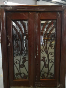 Set of Double Entry Door with Decorative wrought Iron grilles and glass insert