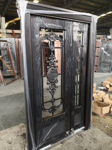 Double Wrought Iron Entry Dor with an Operable glass Panel