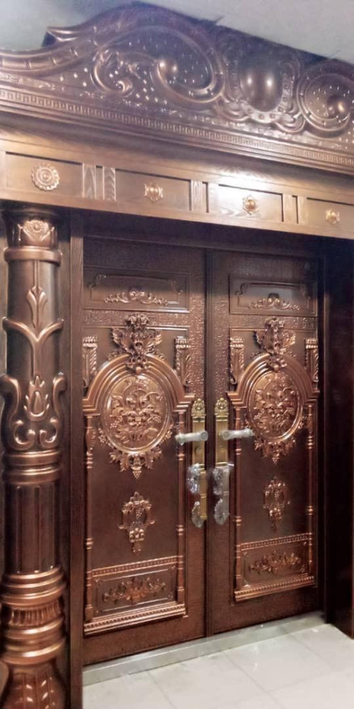 Luxury Copper-coloured Double Security Door with ornate carvings and a maximum pillar and arch design