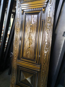 Detailed Gold and Black-finished Security Door