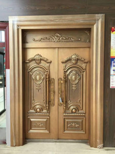 Luxury Cast Aluminum Double Entry Door with Ornate, classical Design and a gold/bronze finish