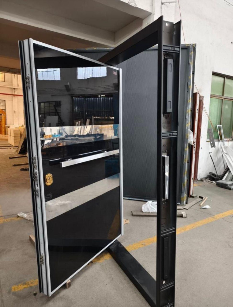 Modern Pivot Security Door with a glossy black and white finish 