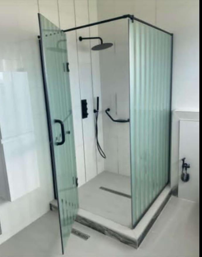 Modern Corner Shower cubicle with a black aluminum frame