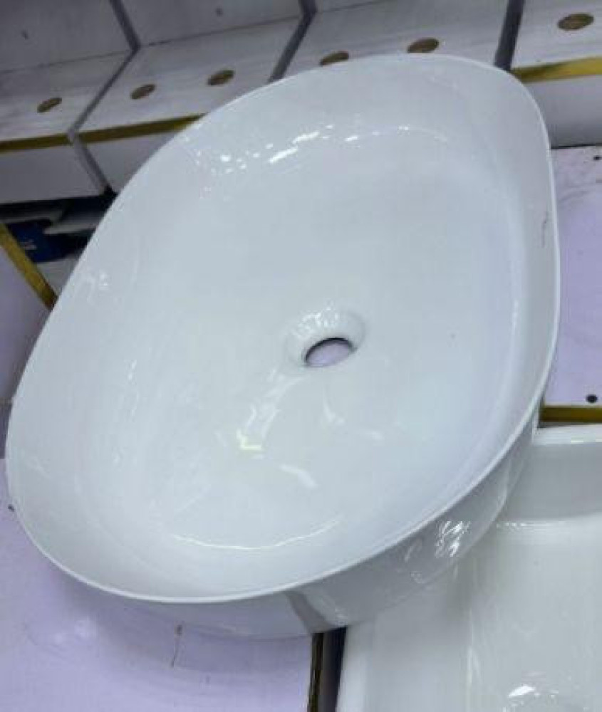White ceramic countertop wash basin