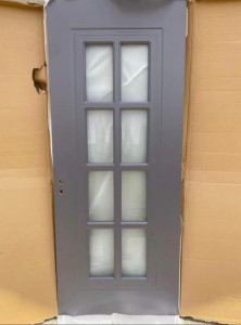 Gray Interior door with glass panels
