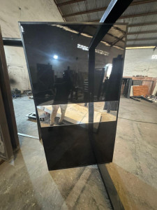 Polished black granite Pivot door