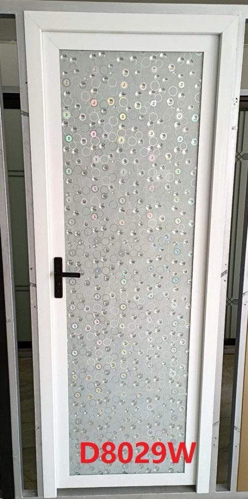 Aluminum-framed door featuring a decorative privacy window film