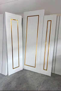 White door with a gold accent frame