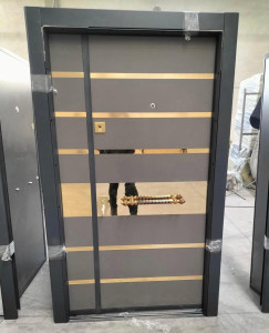 Turkish Security Door featuring gol-tone horizontal accents and a matching pull handle