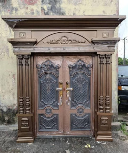 Bronze Circle Carved Door –