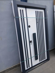Turkish Security door made of armoured steel with a white and dark gray finish