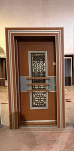 Turkey Steel Security Door with a Brown Finish and a Decorative metal grille insert